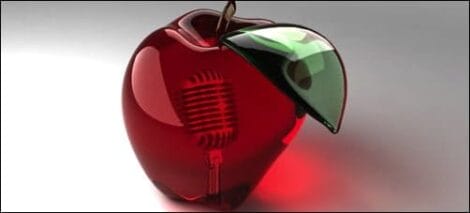 Image: A stylized image of an apple shaped like a vintage microphone with a glossy red body and a shiny green leaf, illuminated with a soft backlight, perfect for voiceover work. -- D.C. Douglas