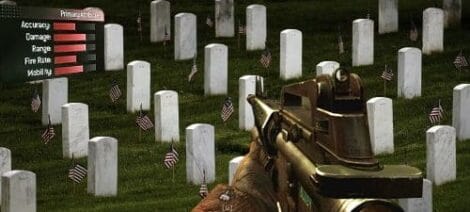 Image: A first-person view from a video game showing a hand holding a weapon, with a stats box on the left and rows of gravestones with American flags in the background. -- D.C. Douglas