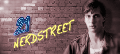 Image: A promotional image for "21 Jump Street," featuring a young man in casual clothing standing against a brick wall, with neon-style text reading "21 Nerd Street" as a tribute to classic youth comed -- D.C. Douglas