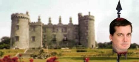 Image: A surreal collage featuring a photo of a man's head superimposed on a sharp medieval spire, set against the backdrop of an expansive castle surrounded by green lawns and red bushes as armies prepare -- D.C. Douglas