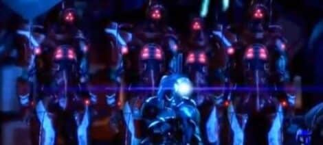 Image: A group of futuristic robots with glowing red eyes stands ominously behind a visible energy barrier, reminiscent of Mass Effect technologies, with a single enhanced robot in the foreground illuminated by blue light. -- D.C. Douglas