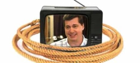 Image: A vintage television showing a smiling man on the screen, surrounded by a coiled rope, on a plain white background, highlighted in the June DCtv Round-Up. -- D.C. Douglas