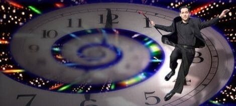 Image: A man in black clothing floats joyfully over a large clock face, surrounded by swirling lights and colorful starbursts, wielding a magic wand, resembling a time-traveling actor. -- D.C. Douglas