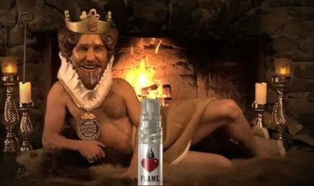 Image: A photoshopped image featuring a man with the updated Burger King mascot's head, wearing a crown, sitting shirtless in a medieval setting. A BK "flame" cologne bottle is also -- D.C. Douglas
