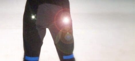 Image: A light shining on a person's leg wearing a P-Cap. -- D.C. Douglas