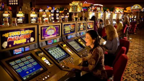 Voice Over: Radio, Streaming, &Amp; Podcast Commercials | D.c. Douglas People playing slot machines in a casino with various gaming screens visible.