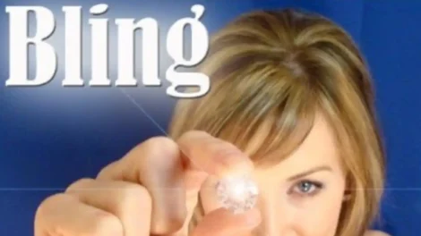 Short Films Library: D.c. Douglas | D.c. Douglas Woman holding a sparkling gem with the word 'Bling' displayed above her.