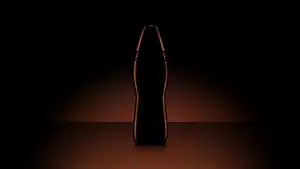 Top 5 Best Commercials Of 2025 | D.c. Douglas Silhouette of a Coca-Cola bottle against a dark background with a subtle glow.