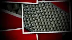 Navigating The Intricacies Of Medical Narration: From Corporate Videos To Patient Education | D.c. Douglas Close-up view of a textured wall panel featuring pyramid-shaped protrusions in a grid pattern.