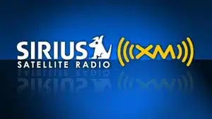 Voice Over: Radio, Streaming, &Amp; Podcast Commercials | D.c. Douglas Sirius Satellite Radio logo featuring a dog and sound wave symbols on a blue background.