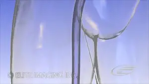 Navigating The Intricacies Of Medical Narration: From Corporate Videos To Patient Education | D.c. Douglas Close-up of a glass and a water pitcher reflecting light against a blue background.