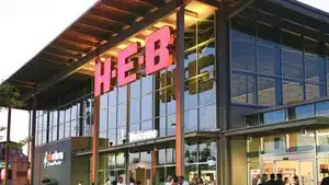 Voice Over: Radio, Streaming, &Amp; Podcast Commercials | D.c. Douglas Exterior view of an H-E-B grocery store featuring large signage and glass facade.