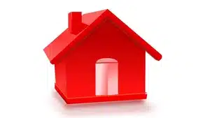 Navigating The Intricacies Of Medical Narration: From Corporate Videos To Patient Education | D.c. Douglas A small red toy house model with a chimney and an open door.