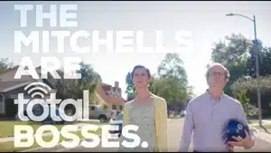Top 5 Best Commercials Of 2025 | D.c. Douglas Promotional image featuring two individuals walking outdoors with text overlay 'The Mitchells Are Total Bosses.'