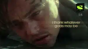 Close-up of a man with a pained expression, partially submerged in water.