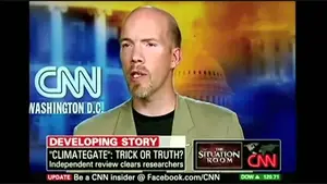 Male speaker discussing a topic during a CNN news segment in Washington D.C.